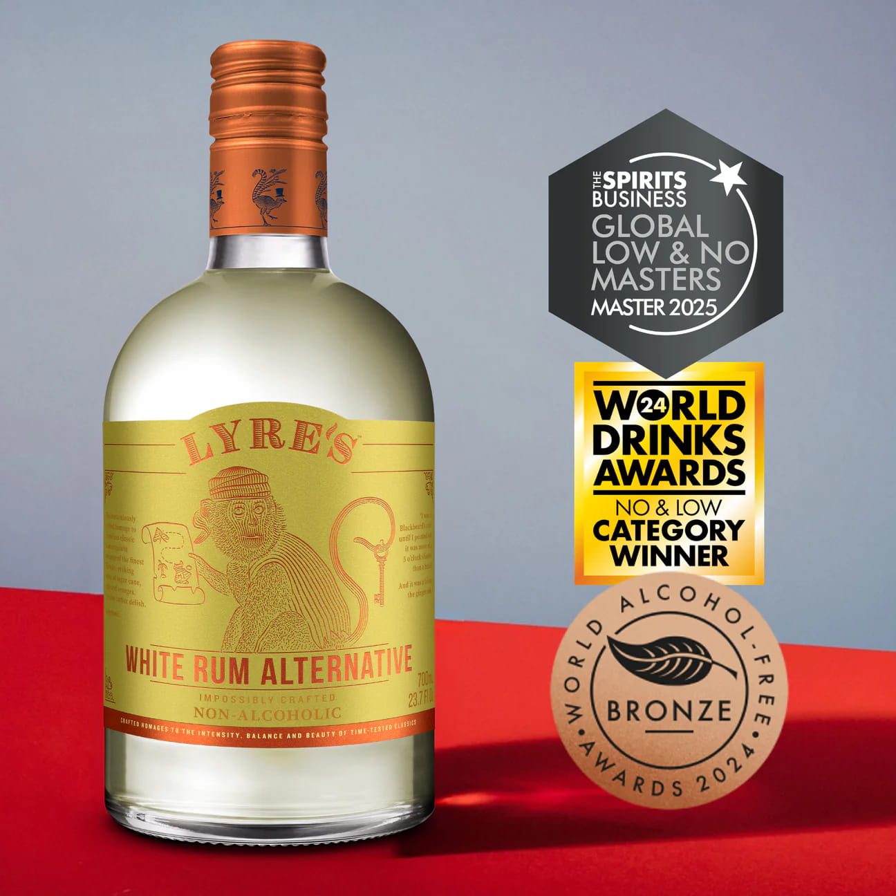 Bottle of Lyre's White Rum Alternative with awards on a red and gray background