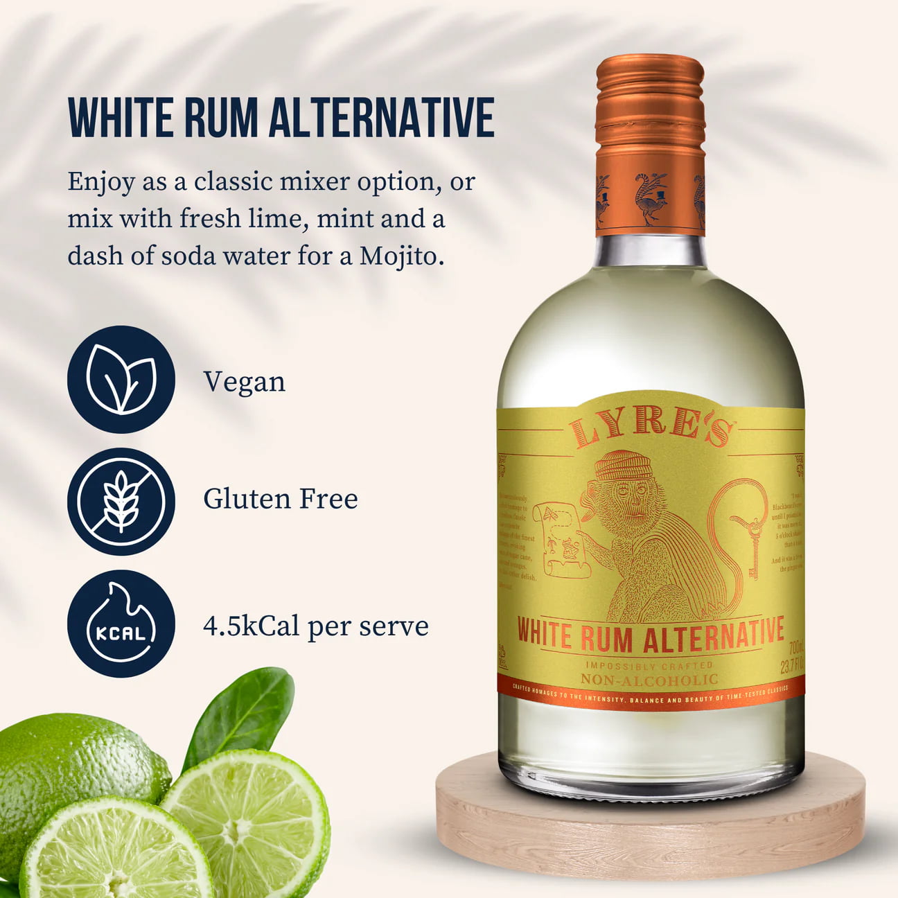 Bottle of Lyres White Rum Alternative with lime slices on a white background