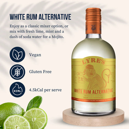 Bottle of Lyres White Rum Alternative with lime slices on a white background