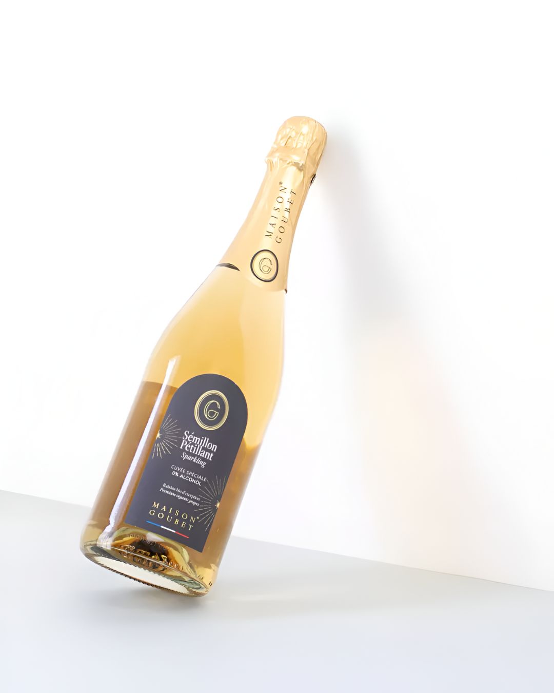 Maison Goubet sparkling non alcoholic drink bottle angled against a white background