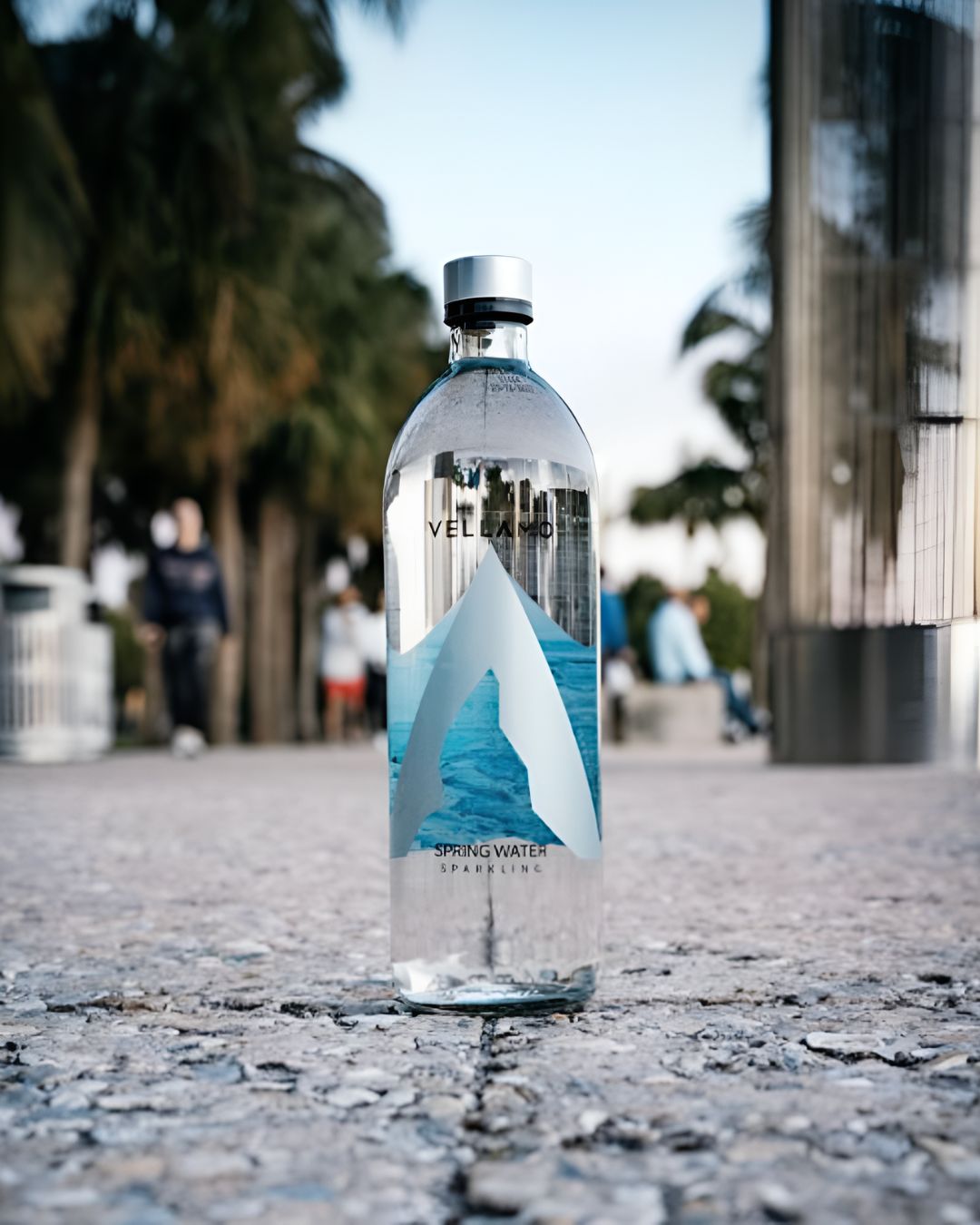 Vellamo sparkling spring water bottle placed outdoors on a city walkway